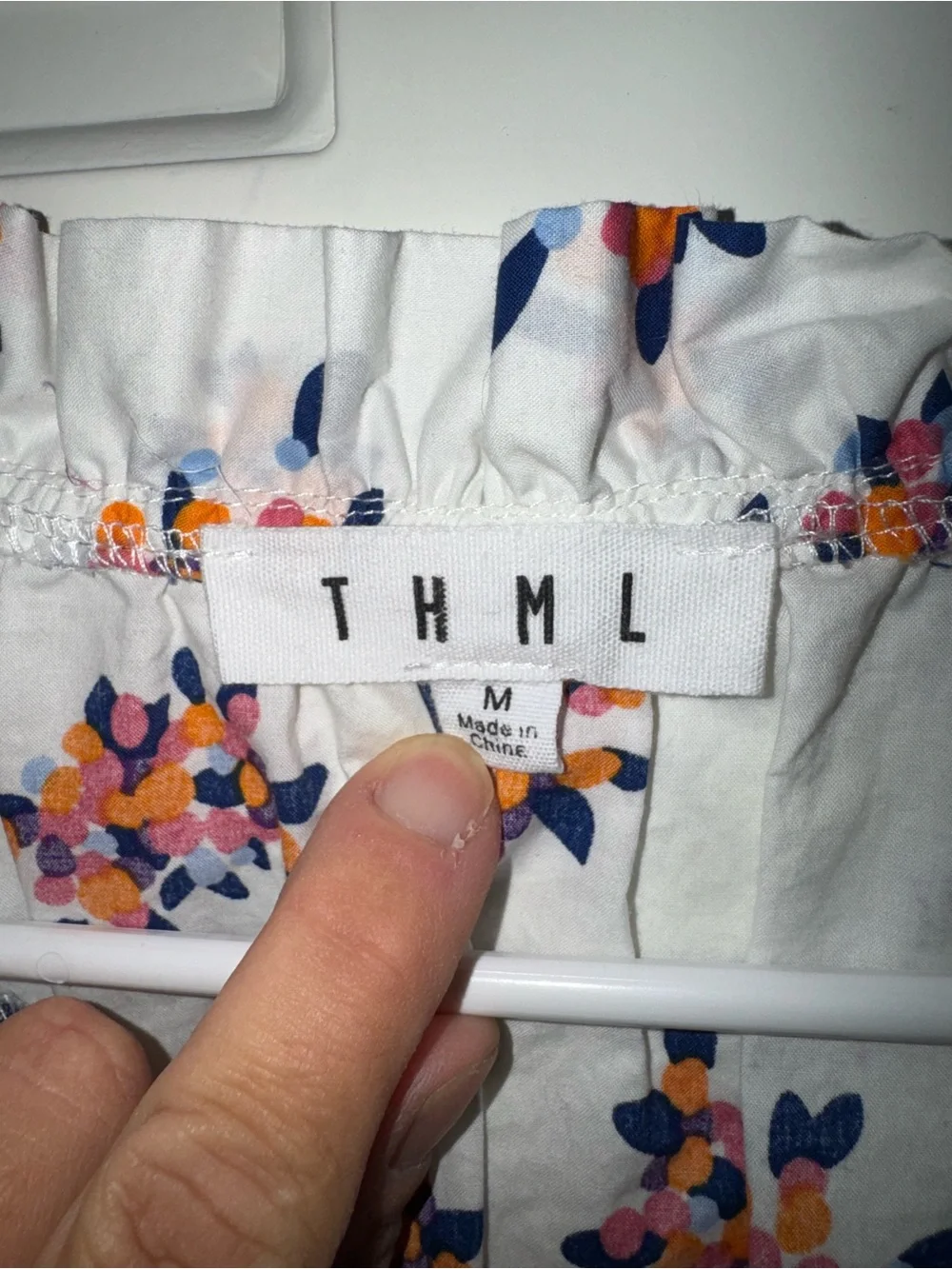 THML White Floral Tassel V-Neck Top with Navy Trim - Picture 2 of 3